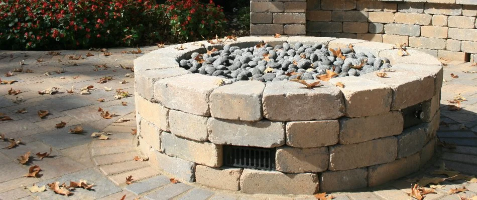 Round, gas-burning fire pit in Memphis, TN.
